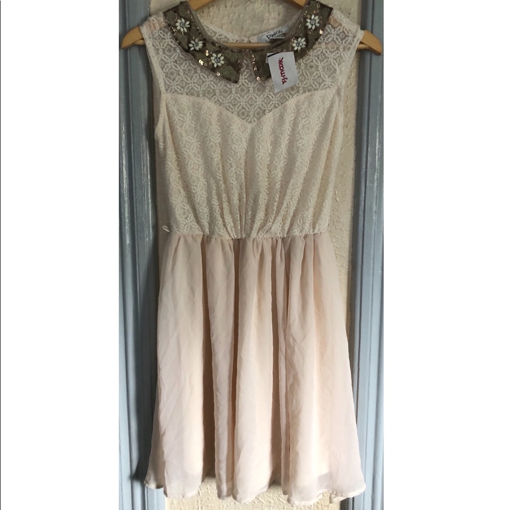 Pinky dress, new with tags. Missing belt. Medium